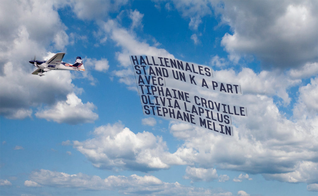 Banderole publicitaire avion stand Un K à part Halliennales